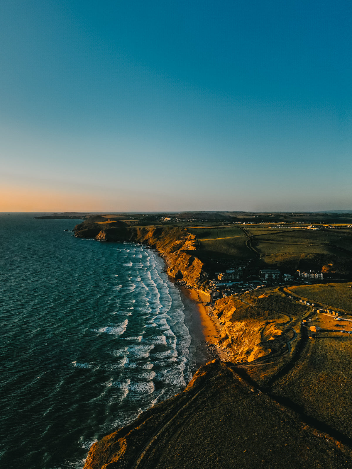 Watergate Bay Sunset Drone Portrait - Print or in a Frame